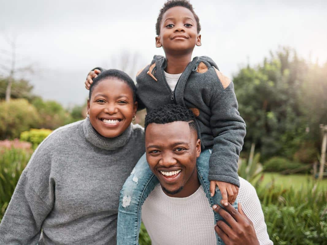 Family-fun-outdoors-mom-dad-son Mother father son outside playful