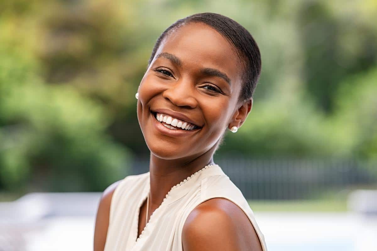 Happy-woman-beautiful-smile-outdoors Dental bridges