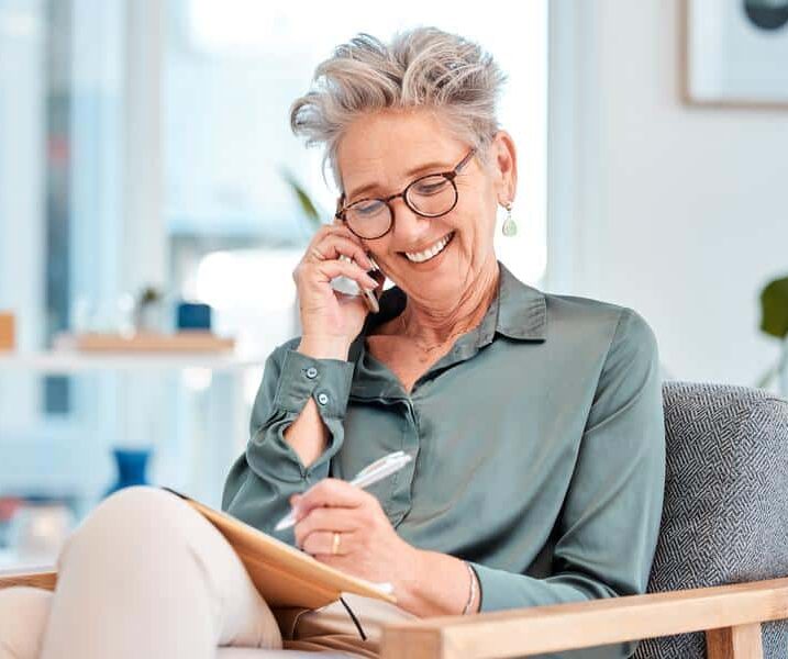 Senior-woman-talking-phone-smiling Patient information