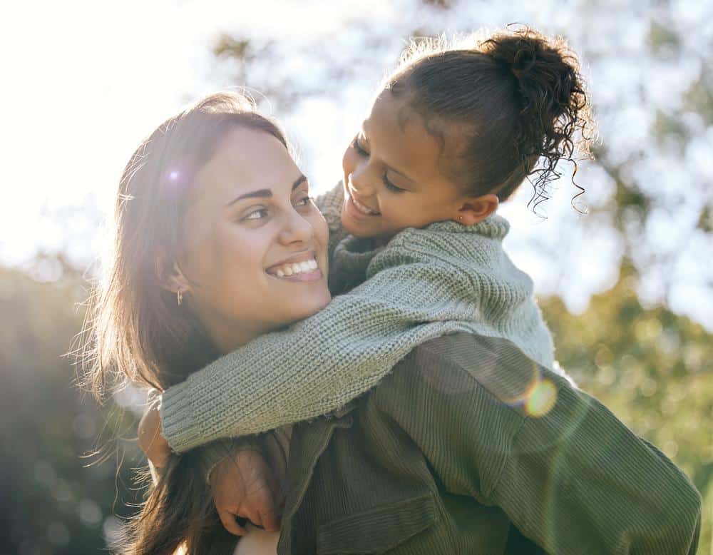 Smiling-mother-daughter-healthy-teeth Dental services